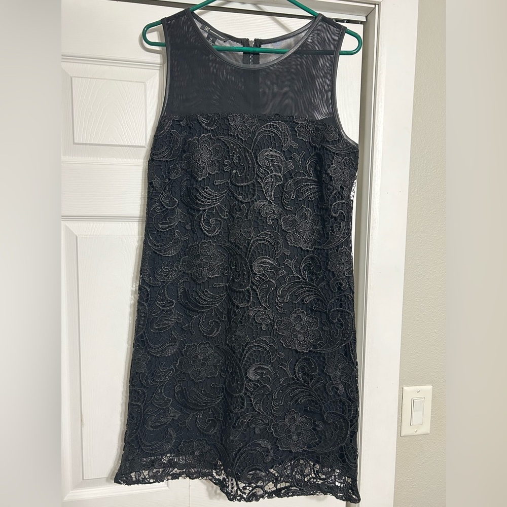 Women’s lace dress with leather detail